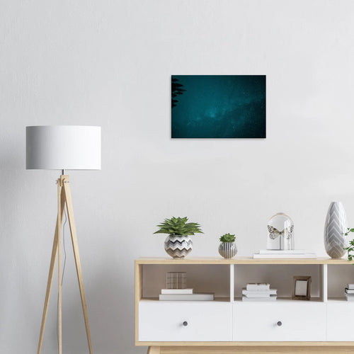 Teal Milky Way Canvas Print – Northern Lights Wall Art — aurora borealis over a dark treeline beneath a teal Milky Way