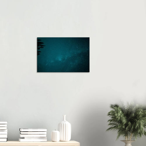 Teal Milky Way Canvas Print – Northern Lights Wall Art — aurora borealis over a dark treeline beneath a teal Milky Way