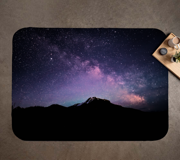 Pink Aurora Lake Reflection Throw Blanket – Medium (Northern Lights) — aurora borealis over a mountain silhouette under a starry sky